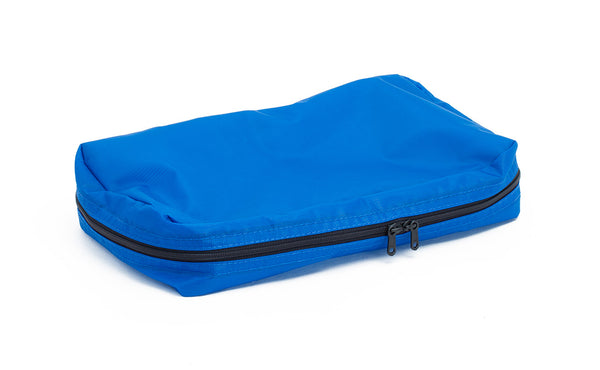 An empty and zipped closed Island (blue) Aether End Pocket Aeronaut 30 Packing Cube.